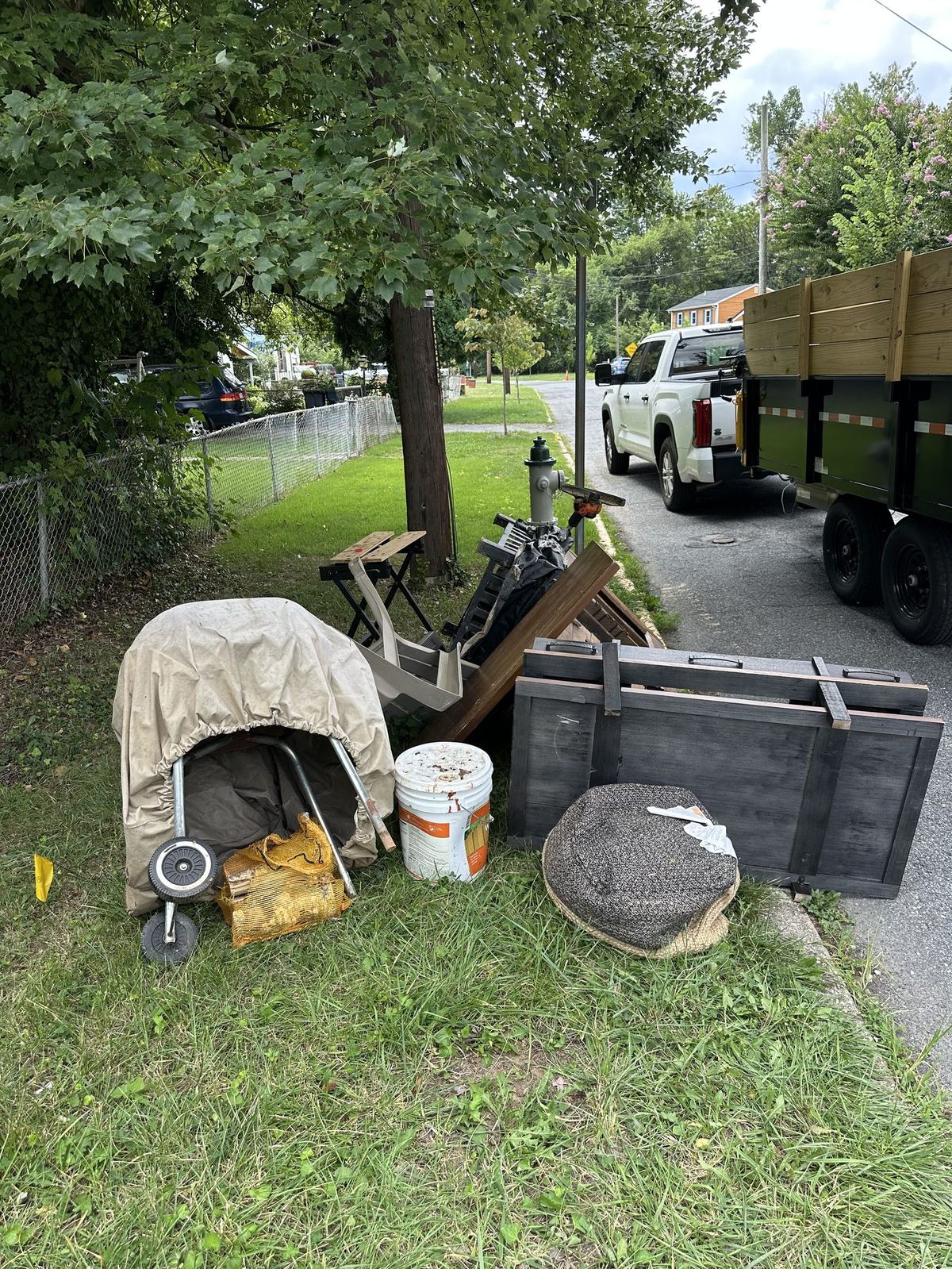 Curb pile before junk removal — Alexandria VA