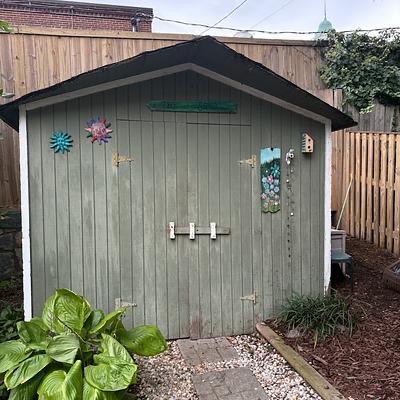 6x10 painted wood shed before demolition — Lyon Park, Arlington VA