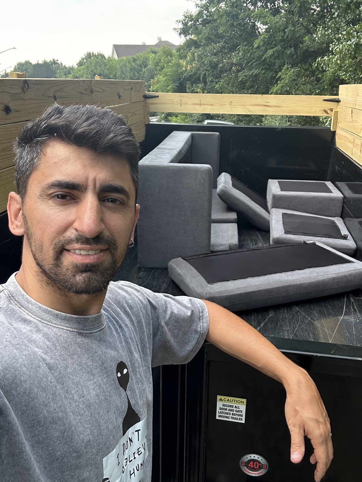 DMV Go Junk owner with loaded sofa on trailer — Arlington, VA