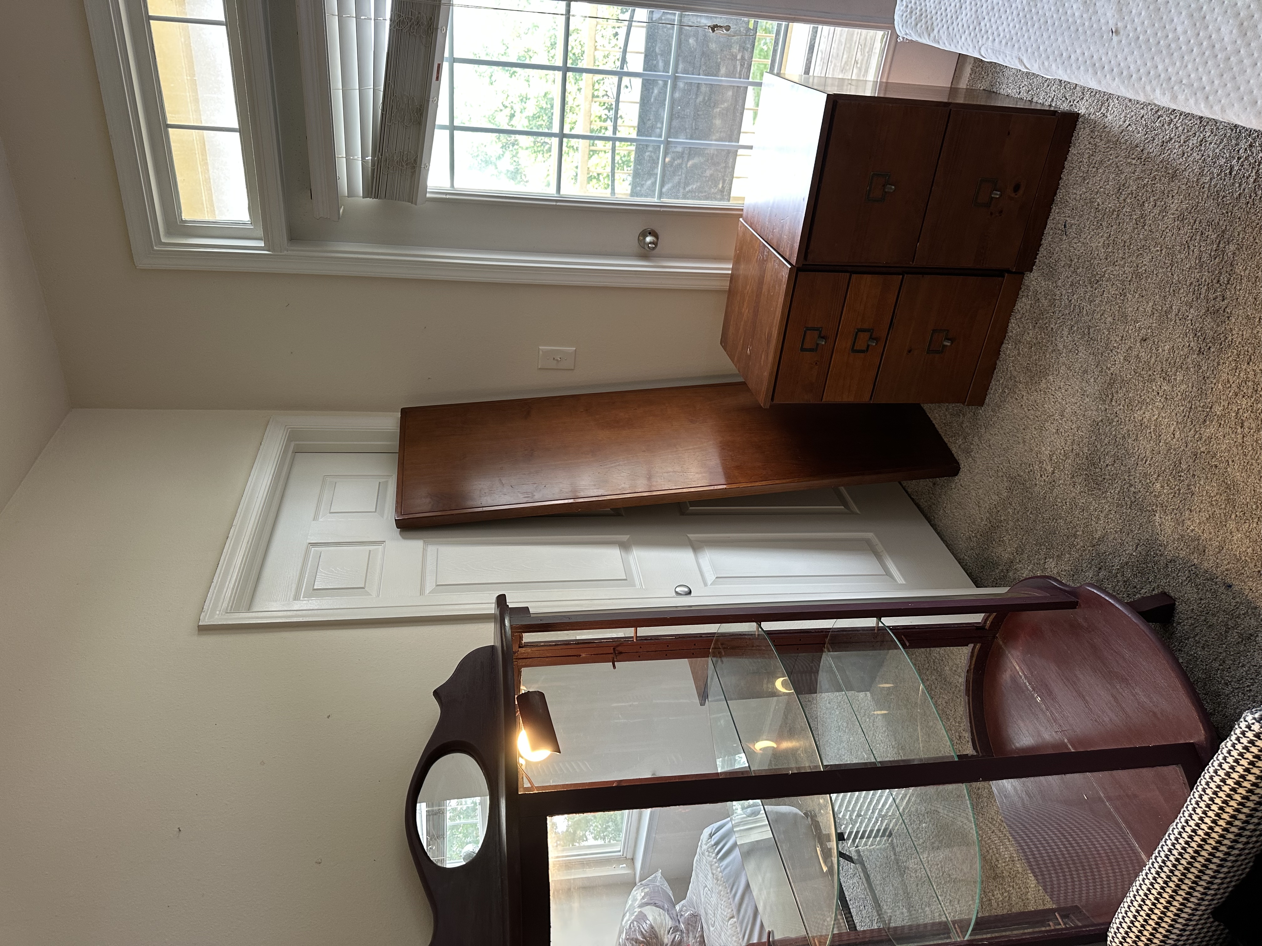 Mirrored curio cabinet, wood file cabinets, and side table staged for pickup — Brambleton, Ashburn VA