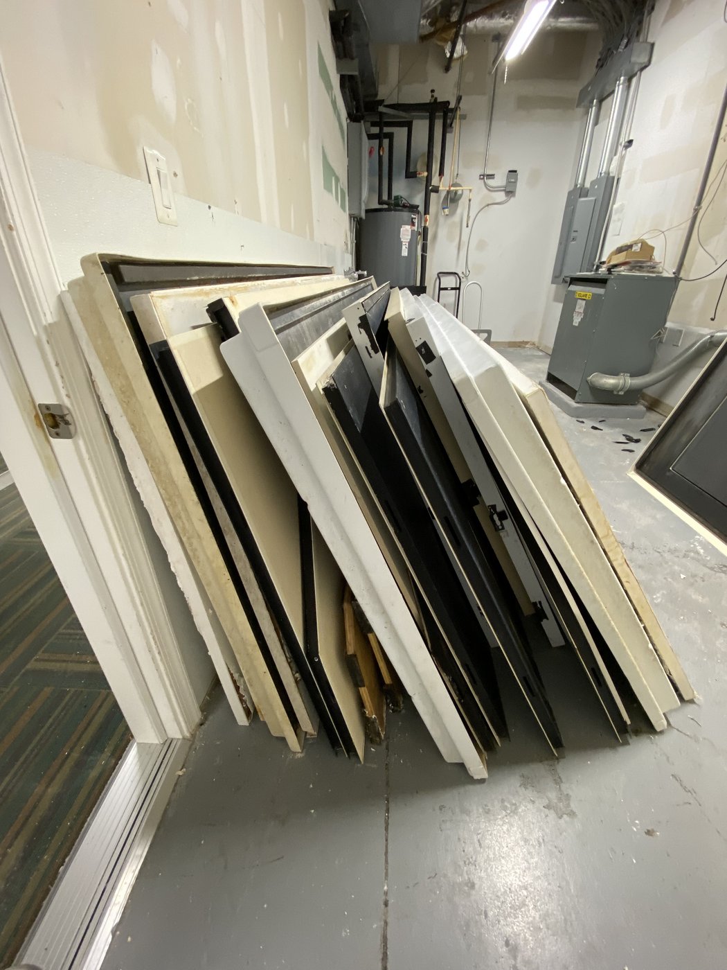 Old panels before removal — Chantilly commercial cleanout