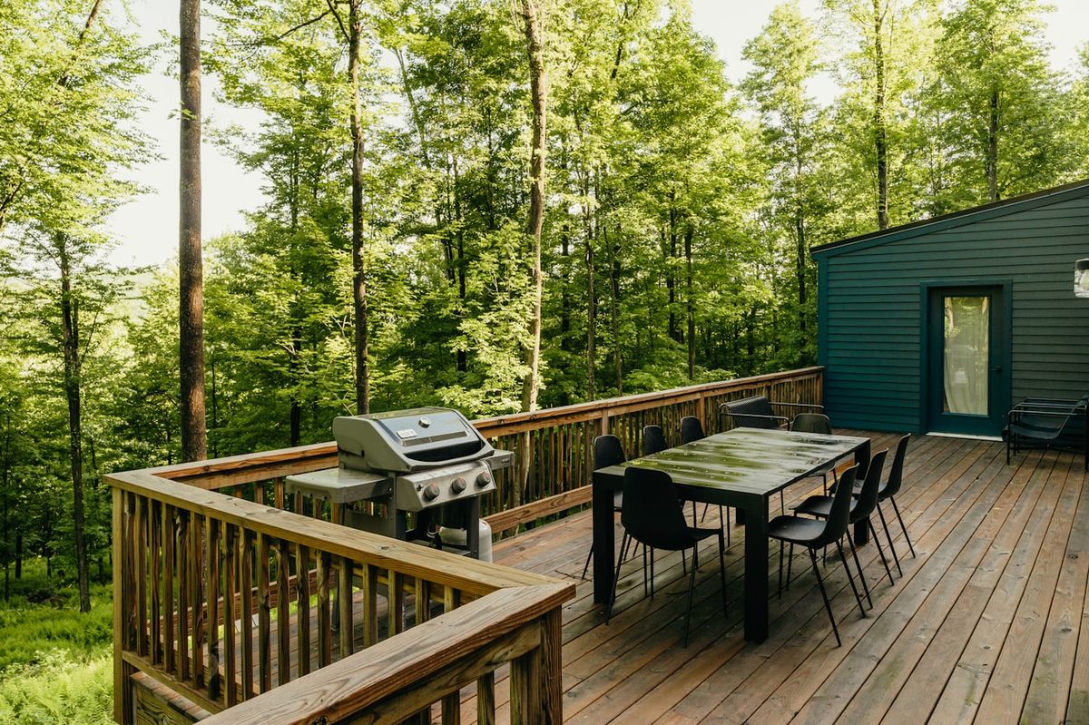 Large multi-level deck on a wooded lot — Northern Virginia