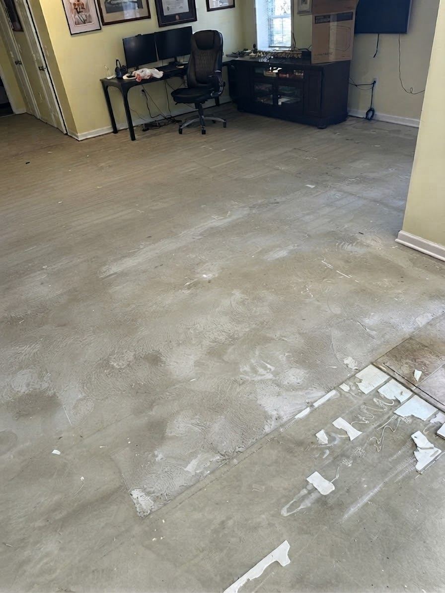Bare subfloor after flooring removal — ready for new installation