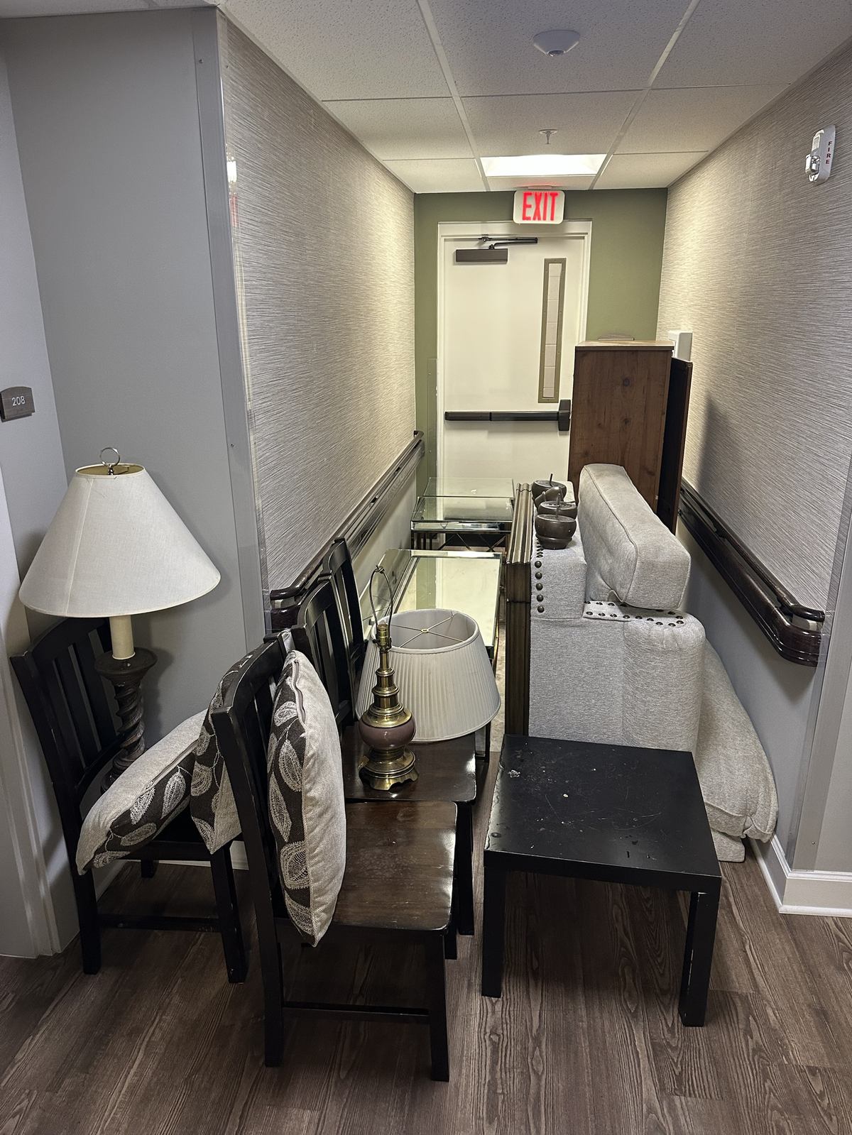 Furniture staged in a hallway before removal — Centreville, VA