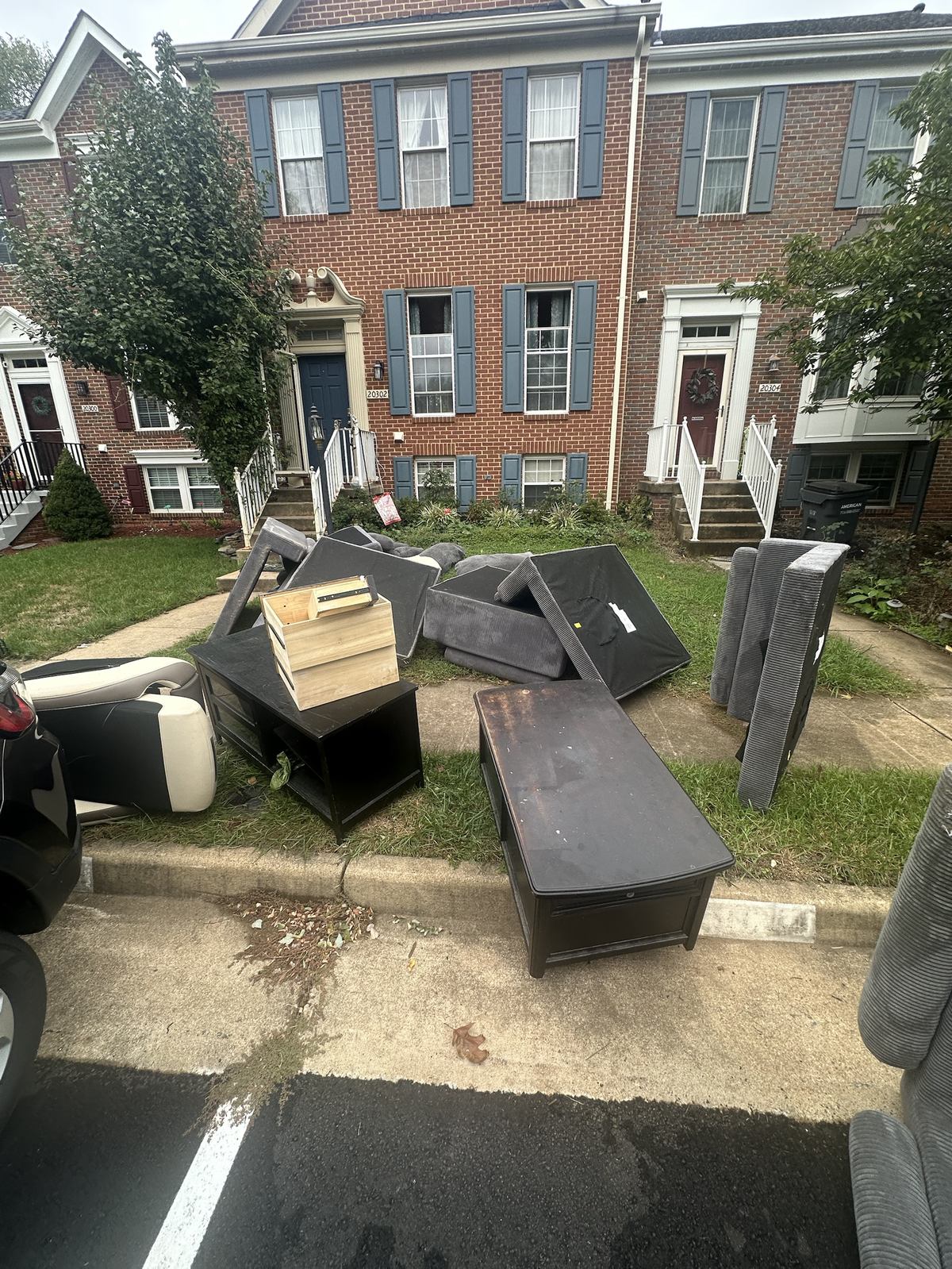 Furniture staged on the lawn before removal — Sterling, VA