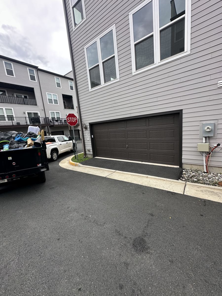 Empty, clear garage front after cleanout — Ashburn, VA