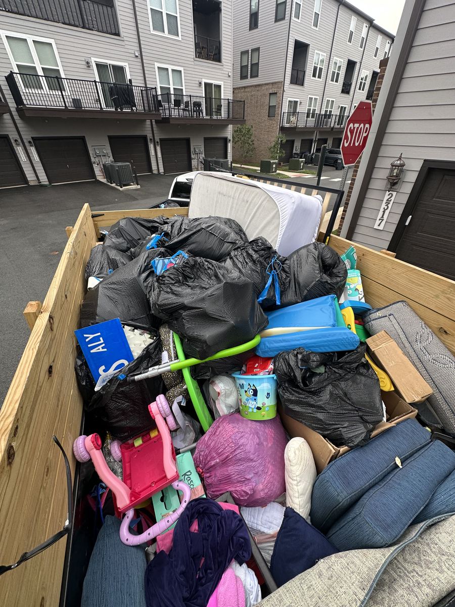 Trailer loaded with moving debris after garage cleanout — Ashburn, VA