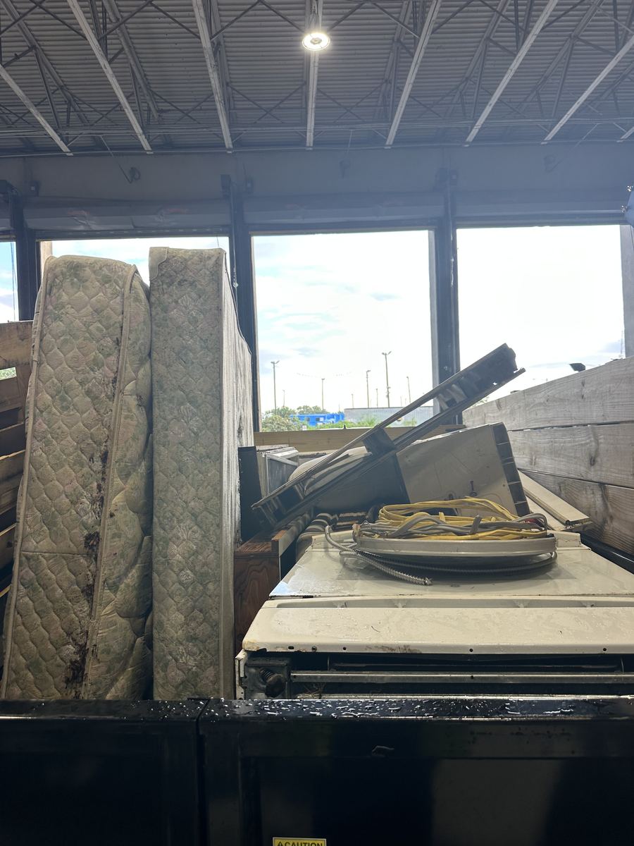 Mattress and box spring loaded for disposal
