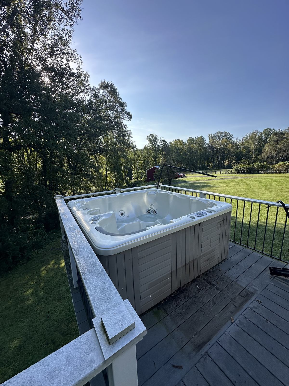 Hot tub uncovered on second-floor deck during removal — Clifton, VA