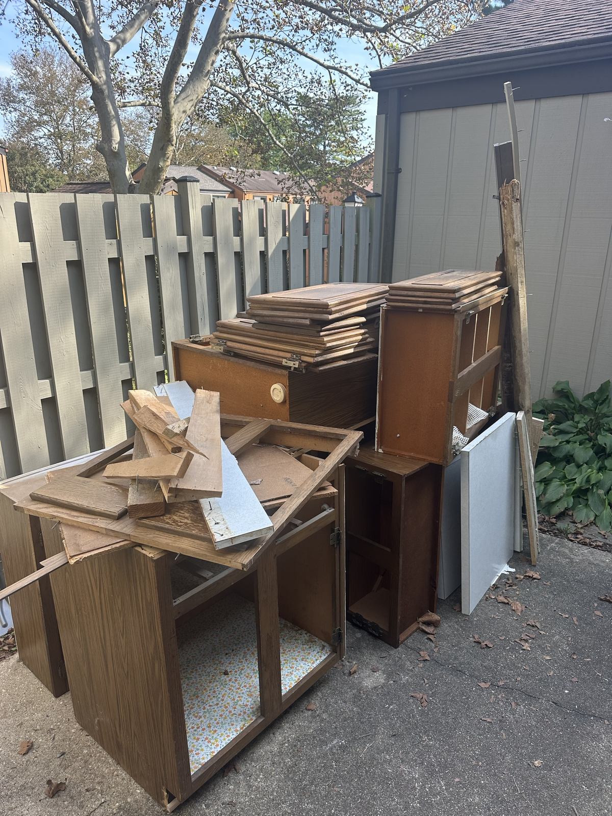 Demoed kitchen cabinets staged for haul-away — Ashburn, VA