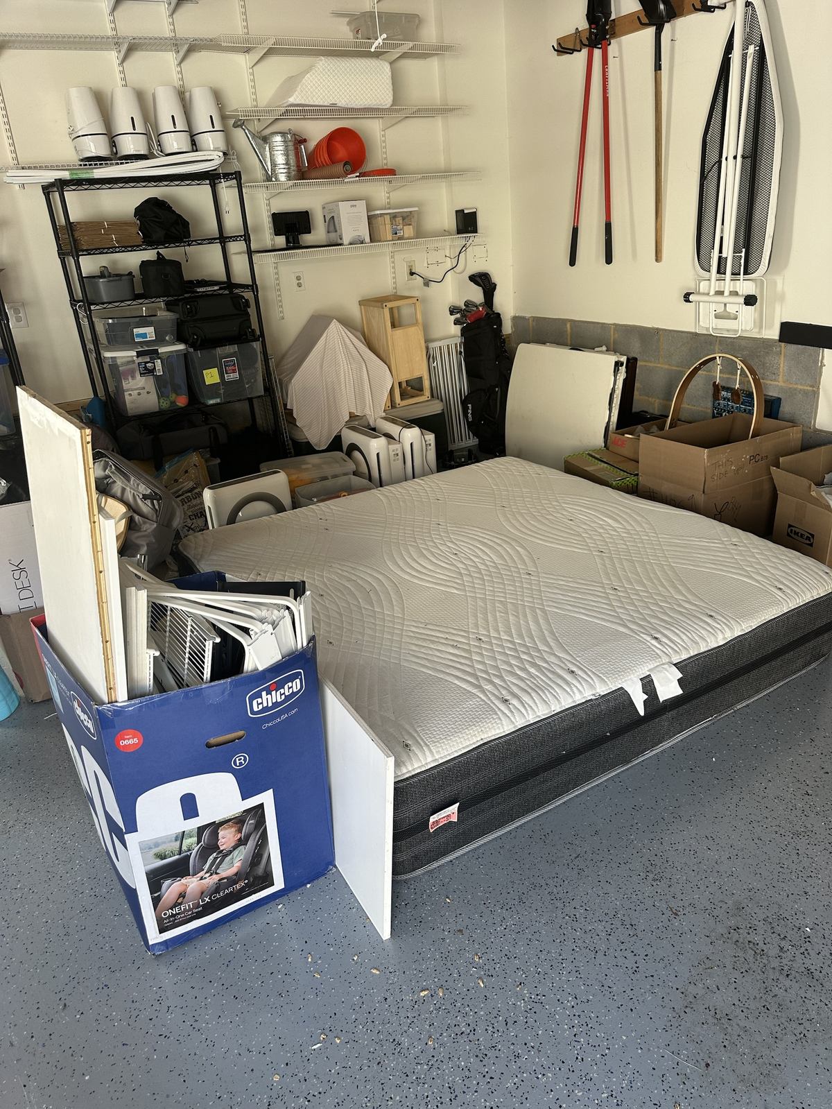 Mattress staged in garage for pickup — Ashburn, VA