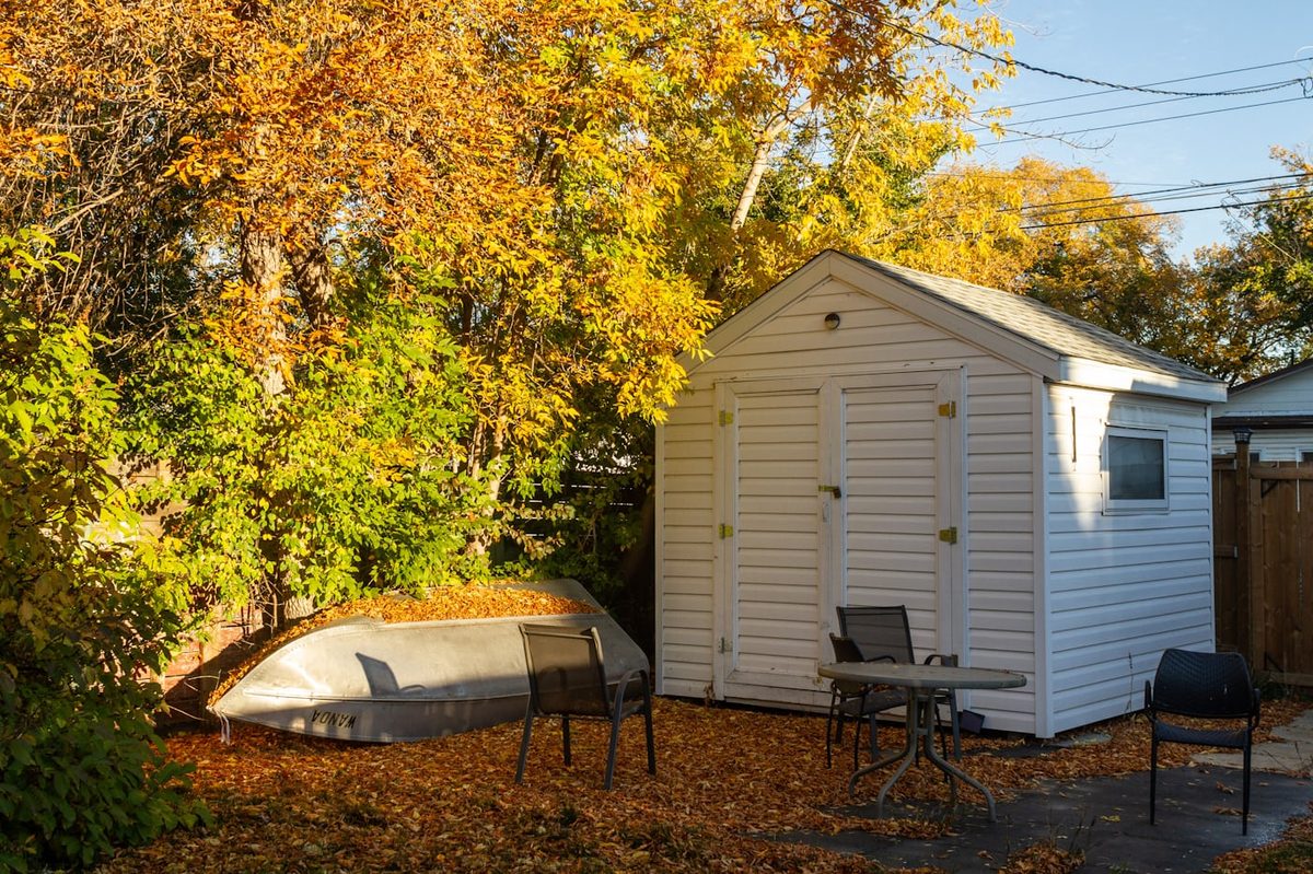 Vinyl backyard shed before demolition — Northern Virginia