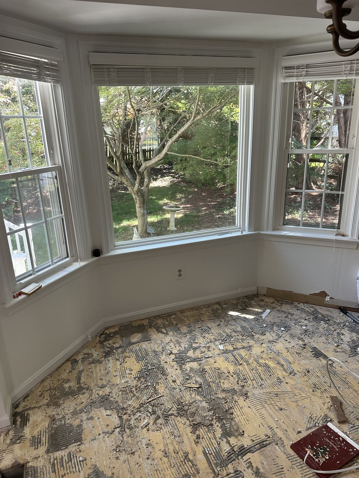 Room cleared of tile debris — Vienna VA renovation